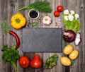 Ingredients for vegetarian cooking on rustic weathered wooden ta Royalty Free Stock Photo