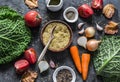 Ingredients for vegetarian delicious lunch - roasted savoy cabbage stuffed with spicy bulgur. Savoy cabbage, vegetables, bulgur on