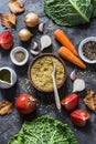 Ingredients for vegetarian delicious lunch - roasted savoy cabbage stuffed with spicy bulgur. Savoy cabbage, vegetables, bulgur on