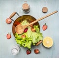 Ingredients vegetarian salad with strawberry, cherry tomatoes, lemon , spices, healthy food, top view