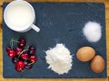 Ingridients for Cherries Clafoutis on slate slab