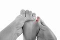 Ingrown toenails on a woman`s foot, isolated on white background, pain in the pinky toe