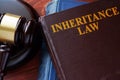 Inheritance law title on a book and gavel. Royalty Free Stock Photo