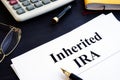 Inherited IRA documents on a table. Retirement plan Royalty Free Stock Photo