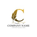 Initial letter C logo with Feather Luxury gold Royalty Free Stock Photo