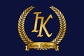 Initial letter I and K, IK monogram logo design with laurel wreath. Luxury golden calligraphy font