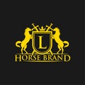 Initial Letter L Logo. Horse Brand Logo design vector. Retro golden crest with shield and horses. Heraldic logo template. Royalty Free Stock Photo