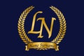Initial letter L and N, LN monogram logo design with laurel wreath. Luxury golden calligraphy font