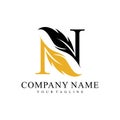 Initial letter N logo with Feather Luxury gold Royalty Free Stock Photo