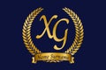 Initial letter X and G, XG monogram logo design with laurel wreath. Luxury golden calligraphy font