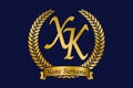 Initial letter X and K, XK monogram logo design with laurel wreath. Luxury golden calligraphy font