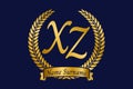 Initial letter X and Z, XZ monogram logo design with laurel wreath. Luxury golden calligraphy font