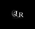 Initial LR letter luxury beauty flourishes ornament monogram logo Royalty Free Stock Photo