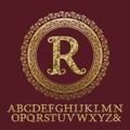 Initial monogram with letters encrusted glittering fragments