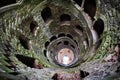 The Initiation well of Quinta da Regaleira in Sintra, Portugal in black and white , downside view.