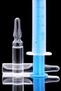 Injection ampule and syringe