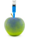 Injection in an apple Royalty Free Stock Photo