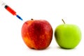 Injection in an apple Royalty Free Stock Photo