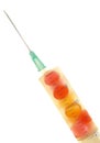 Injection with colored pills inside.