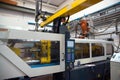 Injection molding machines in a large factory Royalty Free Stock Photo