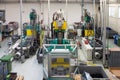 Injection molding machines in a large factory Royalty Free Stock Photo