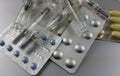 Injectors and pills-tablets Royalty Free Stock Photo