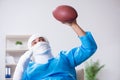 The injured american football player recovering in hospital Royalty Free Stock Photo