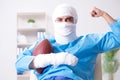 The injured american football player recovering in hospital Royalty Free Stock Photo