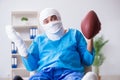 The injured american football player recovering in hospital Royalty Free Stock Photo
