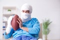 The injured american football player recovering in hospital Royalty Free Stock Photo