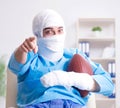 Injured american football player recovering in hospital Royalty Free Stock Photo