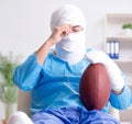 Injured american football player recovering in hospital Royalty Free Stock Photo