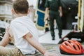 Injured boy getting help from paramedics Royalty Free Stock Photo