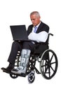 Injured businessman in a wheelchair isolated Royalty Free Stock Photo