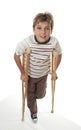 Injured child using crutches