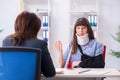 The injured employee visiting lawyer for advice on insurance