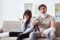 The injured family of wife and husband recovering at home Royalty Free Stock Photo