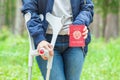 Injured Female With Crutches holding soviet union passport Royalty Free Stock Photo