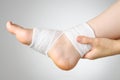 Injured foot with bandage Royalty Free Stock Photo