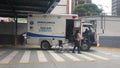 Injured man is brought to the hospital in an ambulance