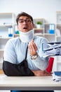 The injured man getting more work from his boss Royalty Free Stock Photo