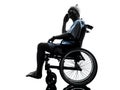 Injured man on the telephone happy in wheelchair