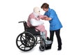 Injured man wheelchair with nurse lifting