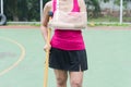 Injured woman wearing sportswear painful arm with gauze bandage Royalty Free Stock Photo