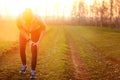 Injuries - sports running knee injury on woman. Royalty Free Stock Photo