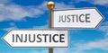 Injustice and justice as different choices in life - pictured as words Injustice, justice on road signs pointing at opposite ways