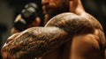 Ink Adorned Powerhouse: Muscular Man\'s Heavily Tattooed Arm Unveiled