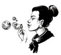 Pretty woman blowing soap bubbles Royalty Free Stock Photo