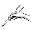 Hand with a chopsticks