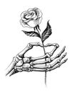 Skeleton hand with a rose